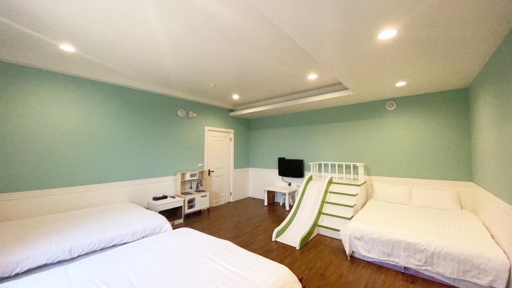 伊莎愛莉溜滑梯親子民宿 Wujie Habitación foto